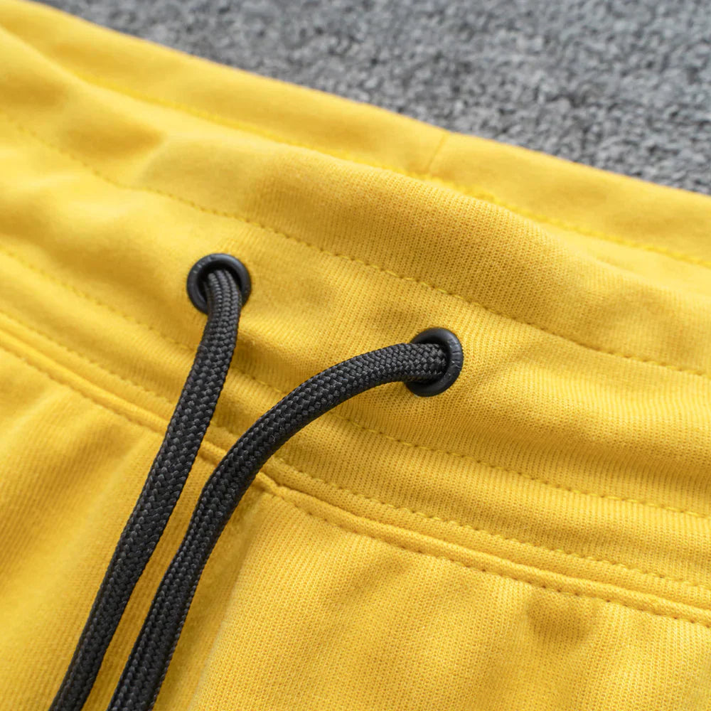 Calça NK Tech Fleece Amarelo