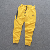 Calça NK Tech Fleece Amarelo