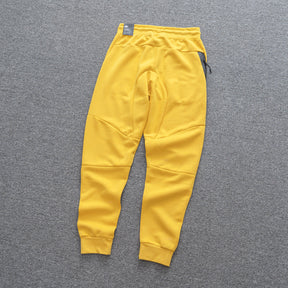 Calça NK Tech Fleece Amarelo