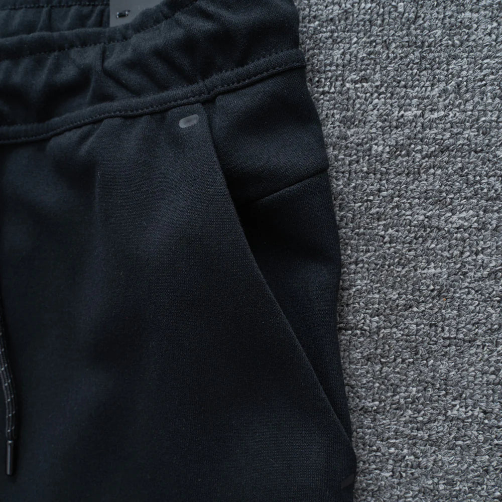 Calça NK Tech Fleece